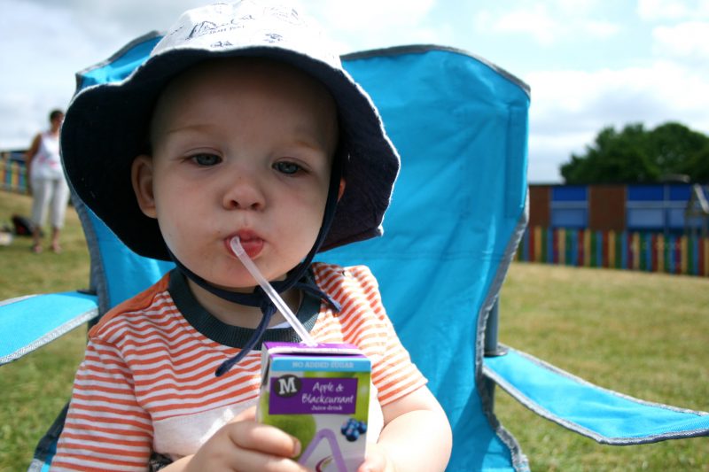 Baby drinking through Straw at Sports Day