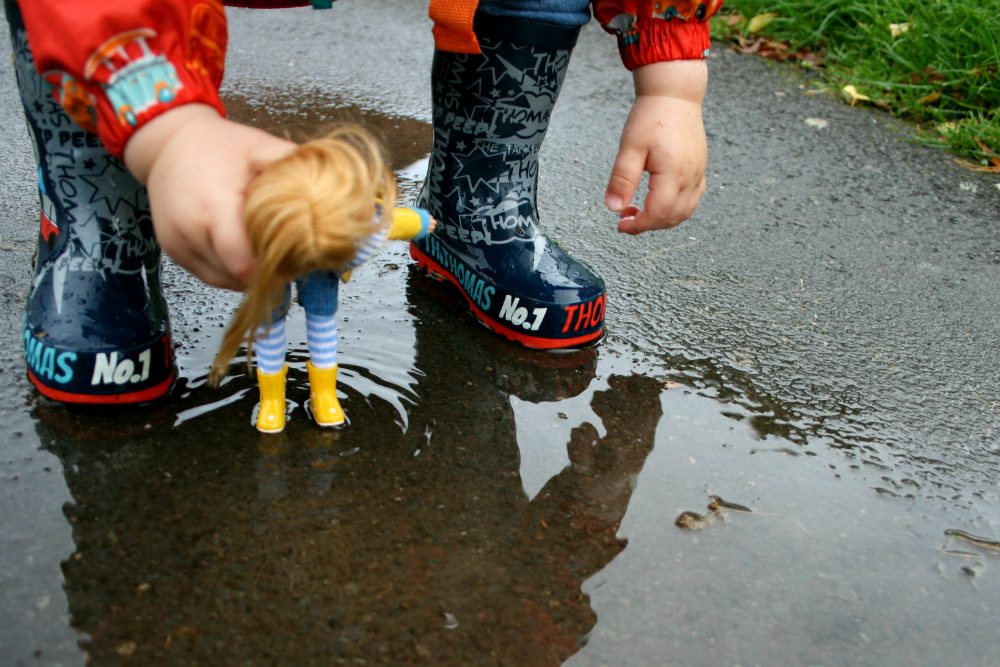 Muddy Puddles Lottie Doll in a Puddle