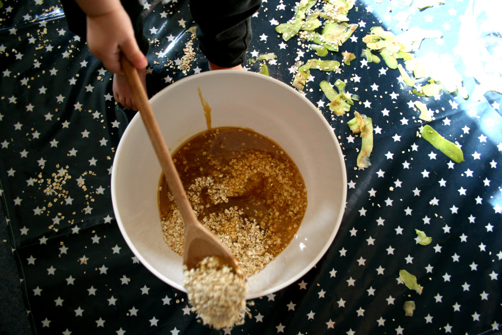 A Bowl on a Messy Me Mat with Oats and Syrup