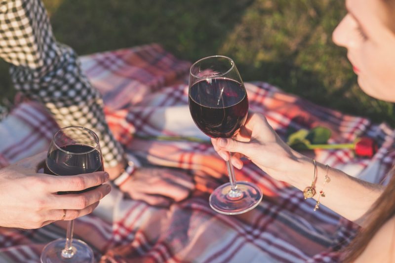 picnic date with wine for an outdoor cinema outdoors date night idea