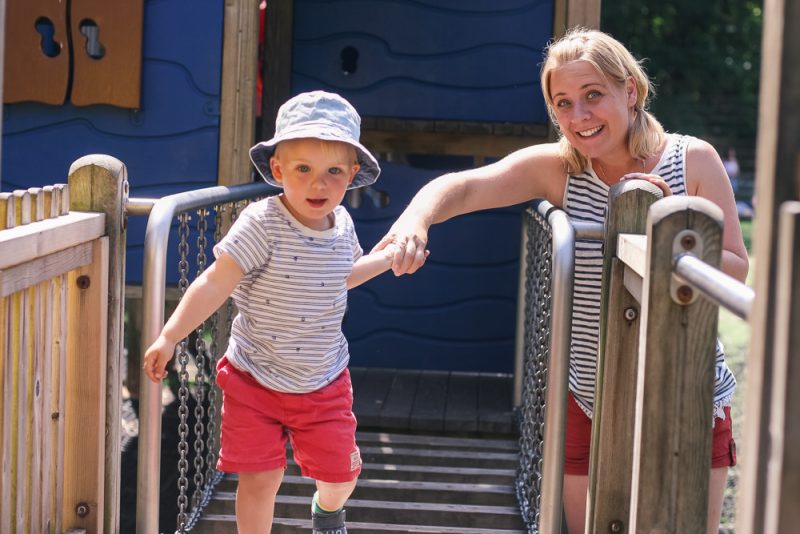 Mommy and Pickle playing on the park in matching outfits at Drayton Manor