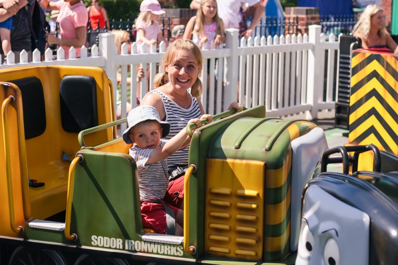 Smiling like a loon on the ride at Thomasland