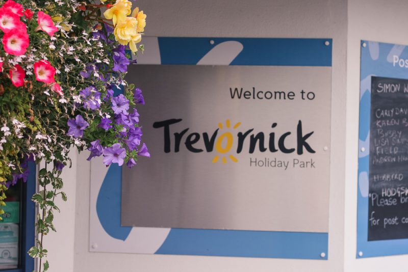 The reception entrance with flowers at Trevornick Cornwall