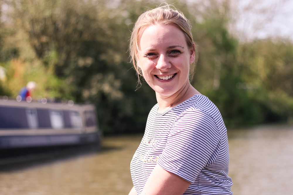 Holly on the front of a canal boat