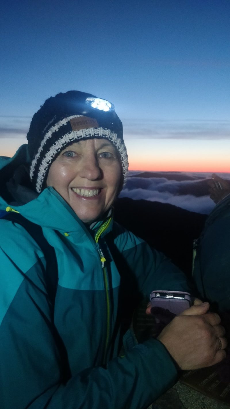 My Mom smiling at the summit